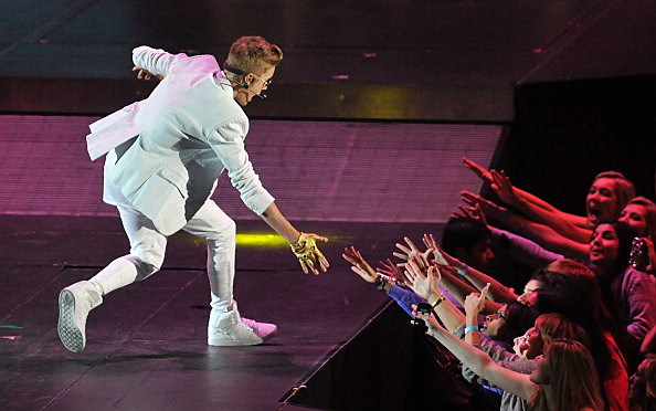 Justin Bieber Performs At The 02 Arena Justin Bieber gets attacked by stage crasher in dubai