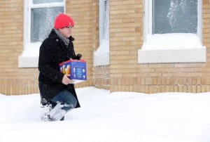 Winter beer Man carrying beer in winter